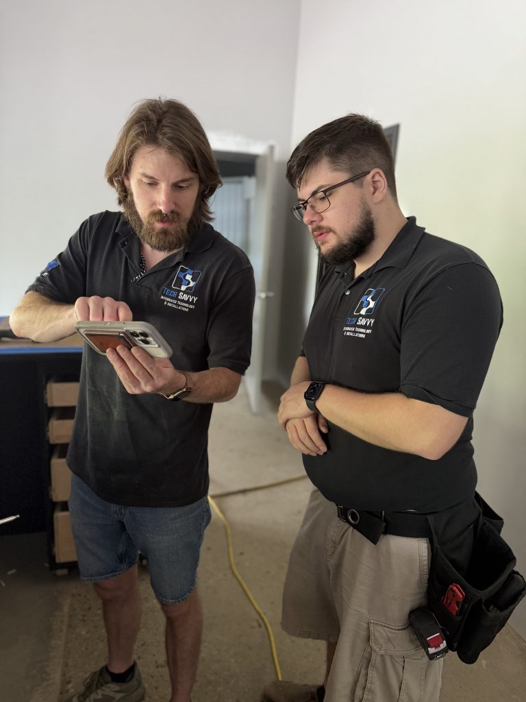 Tech Savvy technicians working together on low voltage cabling