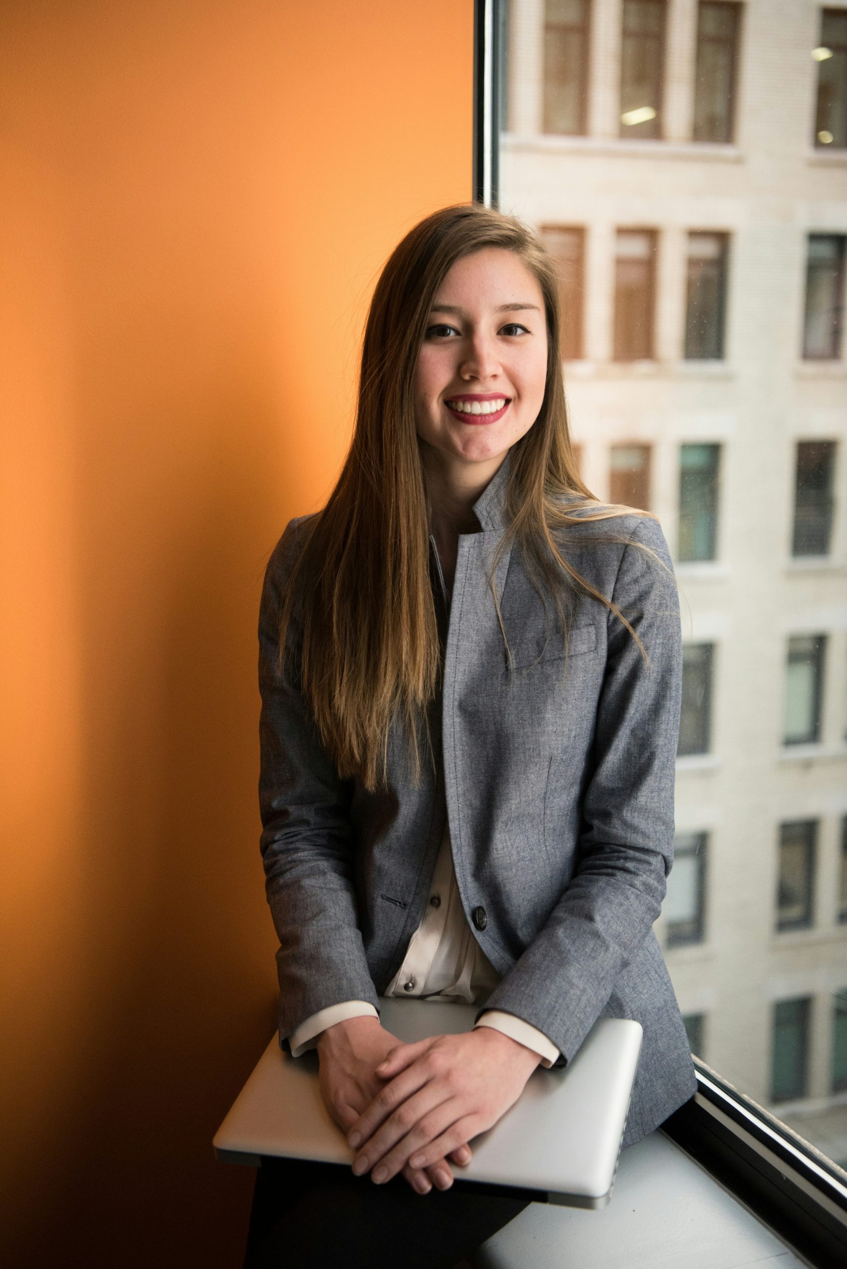 Caucasian woman posing for a reviews picture